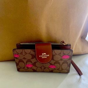 Limited edition wristlet wallet